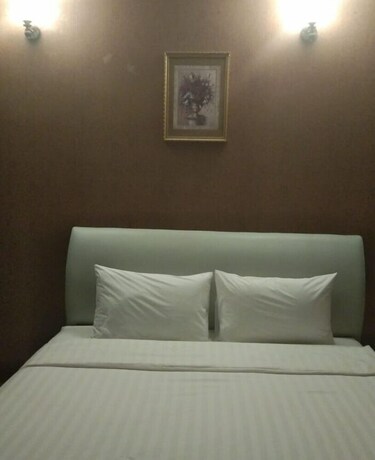 Imagen de la habitación del Hotel Sinnakhone. Foto 22