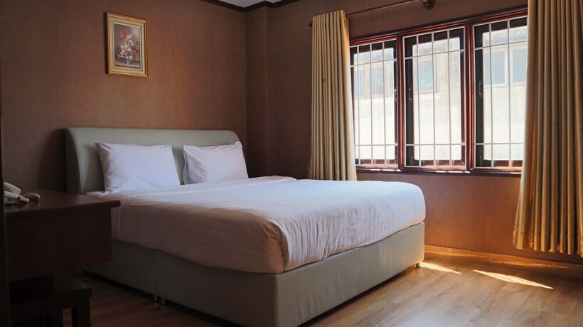 Imagen de la habitación del Hotel Sinnakhone. Foto 23