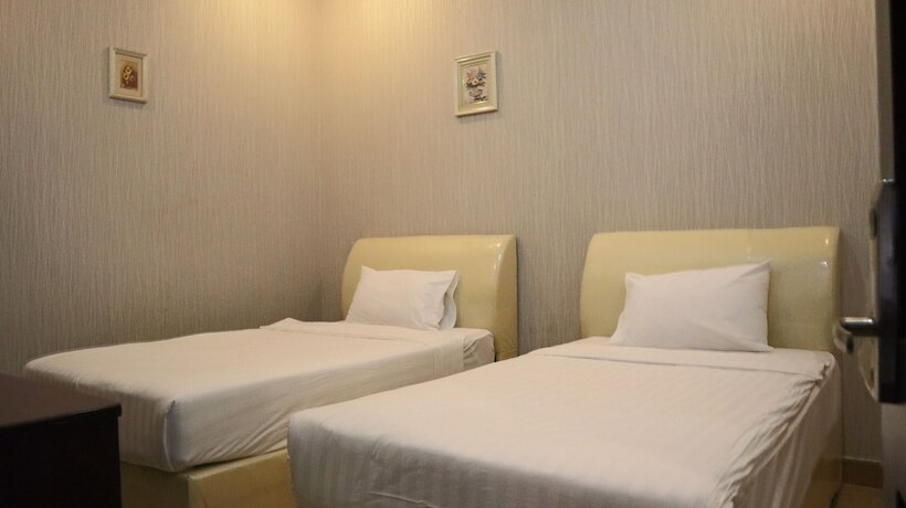 Imagen de la habitación del Hotel Sinnakhone. Foto 24