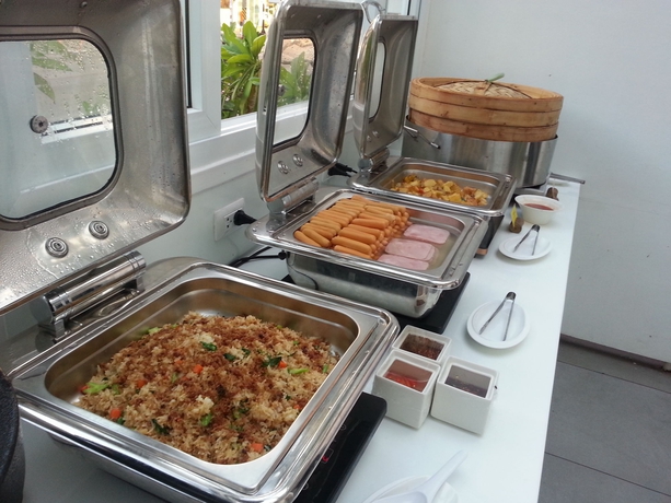 Imagen del bar/restaurante del Hotel Sino House Phuket. Foto 5