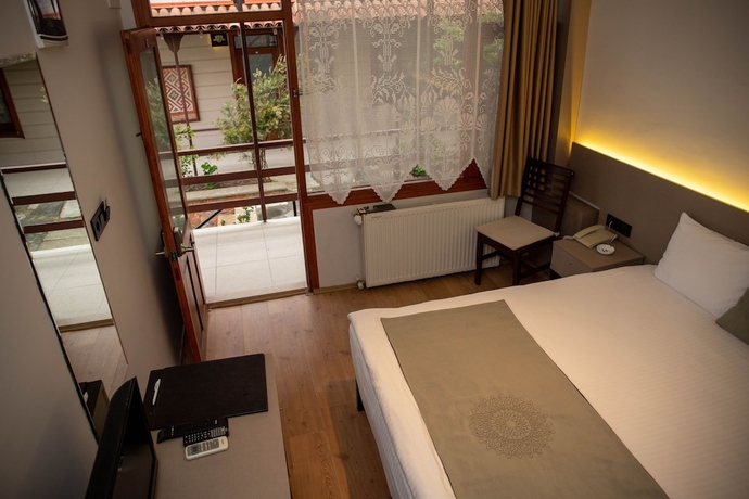 Imagen de la habitación del Hotel Sinop Antik Otel. Foto 16