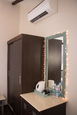 Imagen de la habitación del Hotel Sinq Beach Morjim. Foto 7