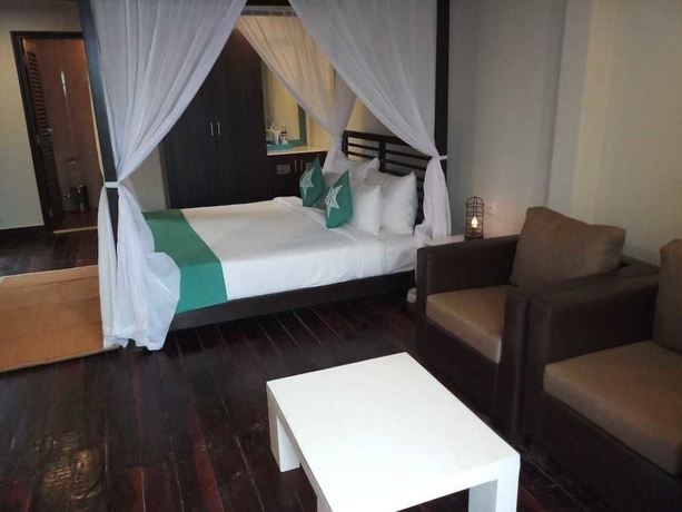 Imagen de la habitación del Hotel Sinq Beach Morjim. Foto 8