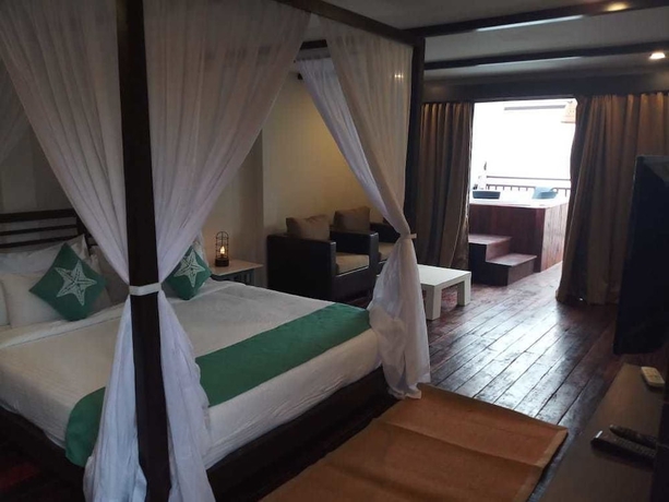 Imagen de la habitación del Hotel Sinq Beach Morjim. Foto 9