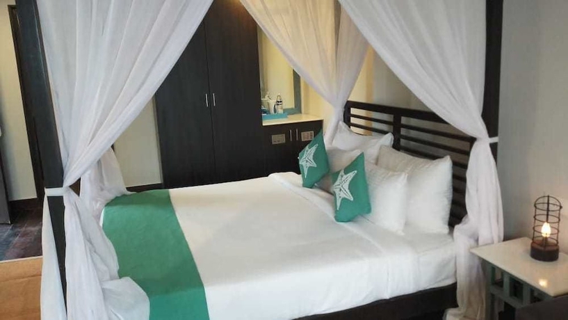 Imagen de la habitación del Hotel Sinq Beach Morjim. Foto 10