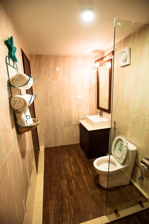 Imagen de la habitación del Hotel Sinq Beach Morjim. Foto 14