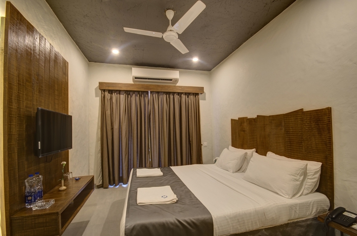 Imagen de la habitación del Hotel Sinq Signature. Foto 8