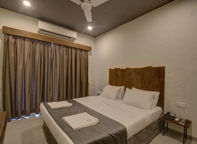 Imagen de la habitación del Hotel Sinq Signature. Foto 9
