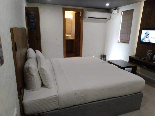 Imagen de la habitación del Hotel Sinq Signature. Foto 11