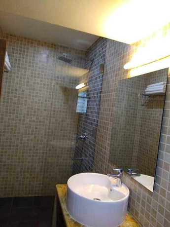 Imagen de la habitación del Hotel Sinq Signature. Foto 12