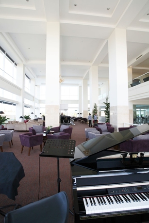 Imagen del bar/restaurante del Hotel Sintesa Peninsula Hotel Manado. Foto 2