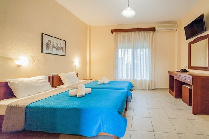 Imagen de la habitación del Hotel Sintrivanis Beach Resort. Foto 15