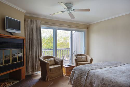 Imagen de la habitación del Hotel Sir Sam's Inn & Spa. Foto 7