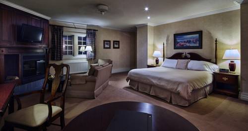 Imagen de la habitación del Hotel Sir Sam's Inn & Spa. Foto 10