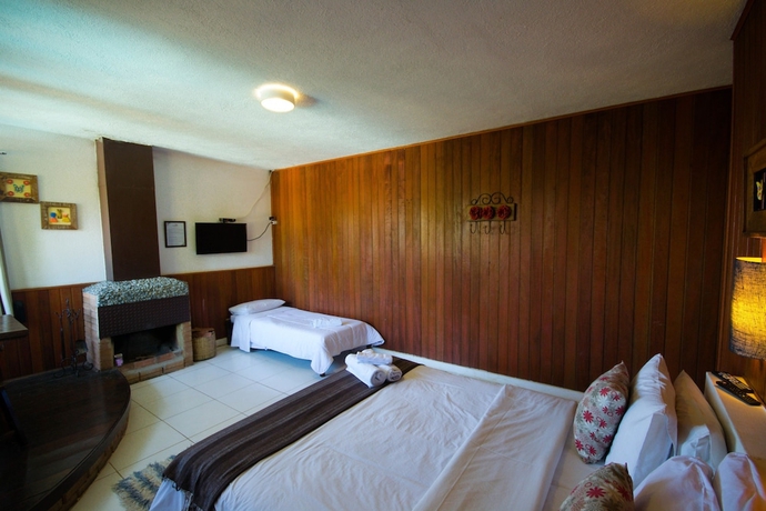 Imagen de la habitación del Hotel Siramat. Foto 9