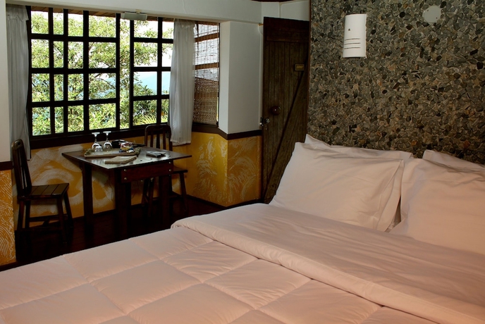 Imagen de la habitación del Hotel Siramat. Foto 14