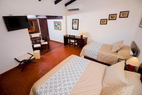 Imagen de la habitación del Hotel Sirari Suites, Santa Cruz. Foto 6