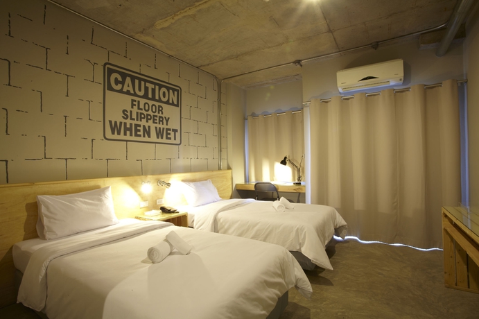 Imagen de la habitación del Hotel Siri Oriental Bangkok. Foto 2