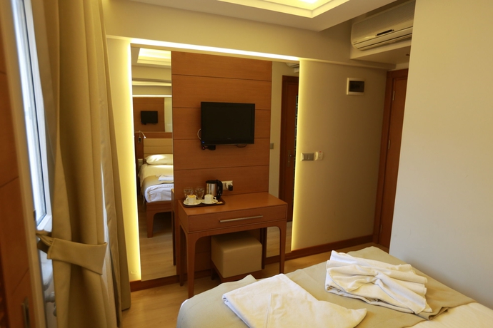 Imagen de la habitación del Hotel Sirkeci Park Hotel. Foto 8