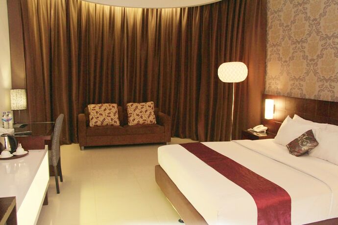 Imagen de la habitación del Hotel Sisingamangaraja Guest House Semarang. Foto 23