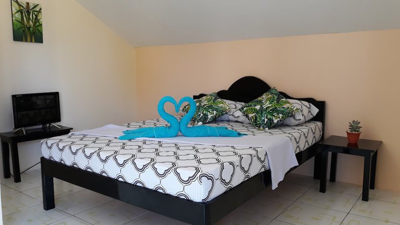 Imagen de la habitación del Hotel Sisters Inn Moalboal. Foto 18