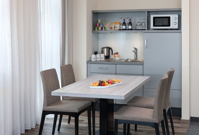 Imagen de la habitación del Hotel Si-suites. Foto 15