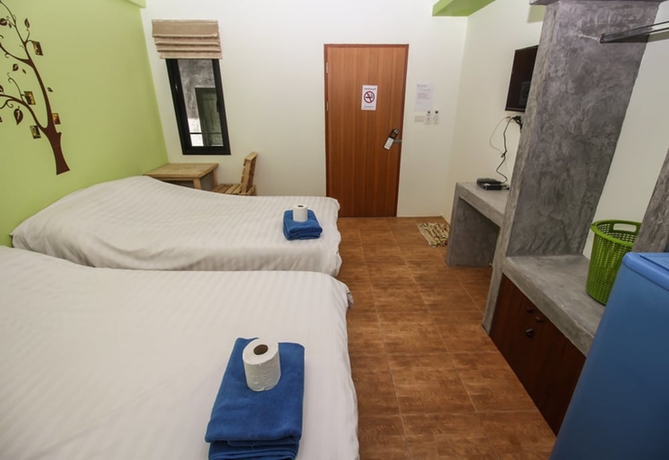 Imagen de la habitación del Hotel Six Pack Cottage. Foto 8