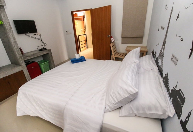 Imagen de la habitación del Hotel Six Pack Cottage. Foto 10