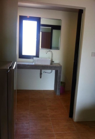 Imagen de la habitación del Hotel Six Pack Cottage. Foto 19