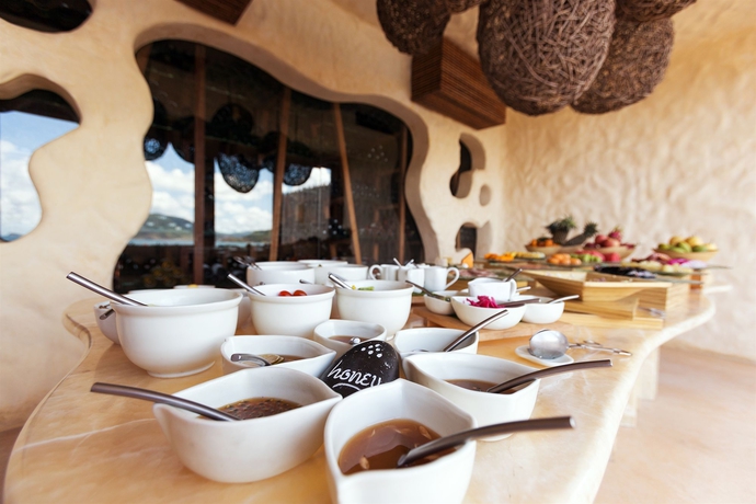 Imagen del bar/restaurante del Hotel Six Senses Con Dao. Foto 11