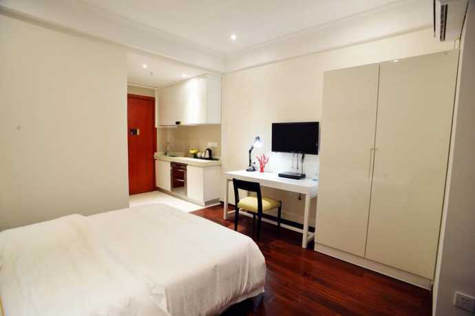 Imagen de la habitación del Hotel Sixiangjia Apart Foshan. Foto 13
