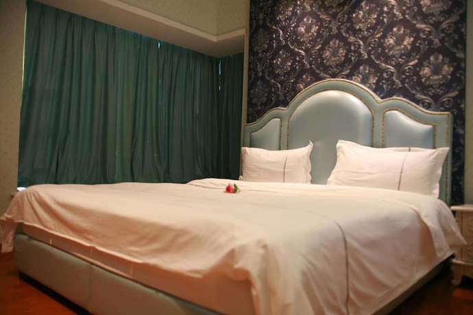 Imagen de la habitación del Hotel Sixiangjia Apartment. Foto 2
