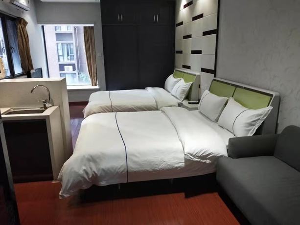 Imagen de la habitación del Hotel Sixiangjia Apartment. Foto 5