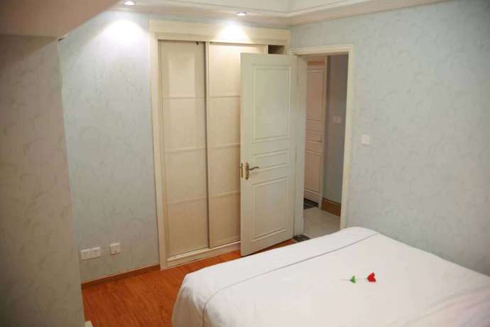 Imagen de la habitación del Hotel Sixiangjia Apartment. Foto 6
