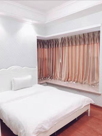 Imagen de la habitación del Hotel Sixiangjia Apartment. Foto 7