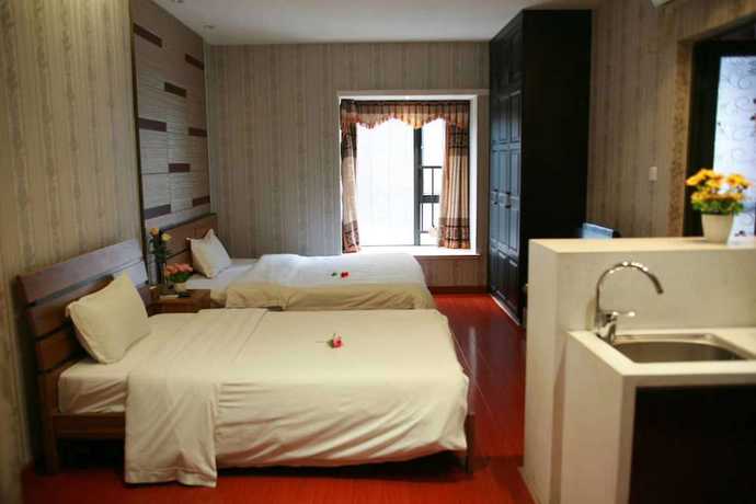 Imagen de la habitación del Hotel Sixiangjia Apartment. Foto 12