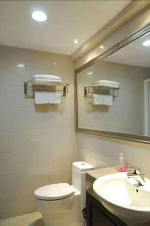 Imagen de la habitación del Hotel Sixiangjia Apartment. Foto 14