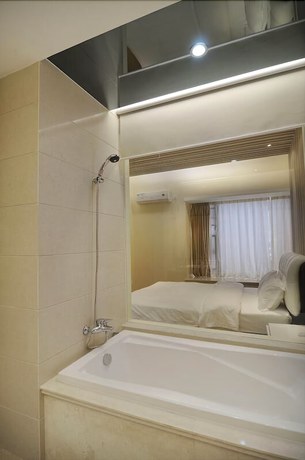 Imagen de la habitación del Hotel Sixiangjia Apartment. Foto 16