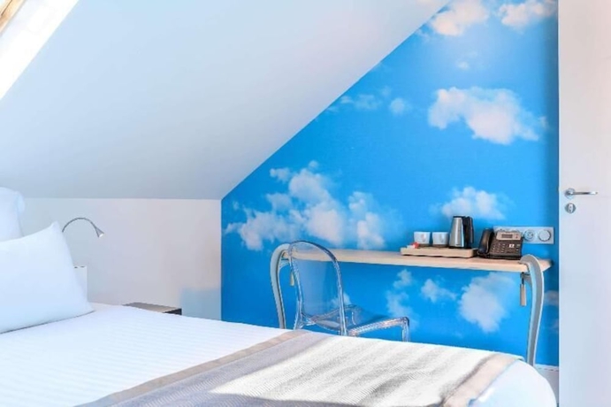 Imagen de la habitación del Hotel Sixteen Paris Montrouge. Foto 17