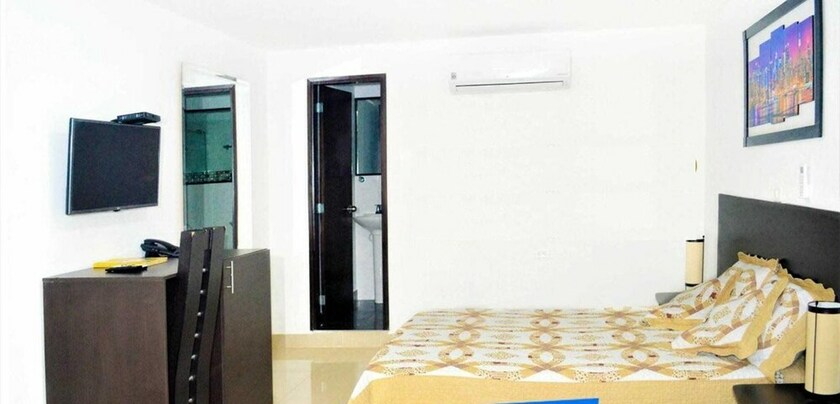 Imagen de la habitación del Hotel Sixth House Suite. Foto 11