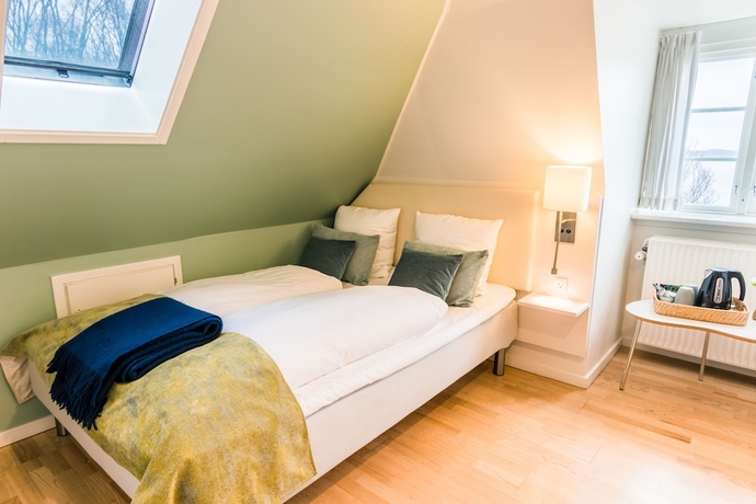 Imagen de la habitación del Hotel Sixtus Sinatur Og Konference. Foto 4
