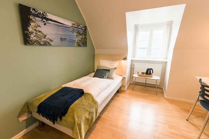 Imagen de la habitación del Hotel Sixtus Sinatur Og Konference. Foto 6