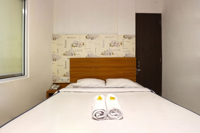 Imagen de la habitación del Hotel Size Inn. Foto 3