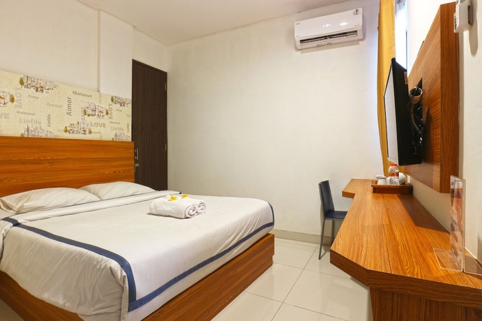 Imagen de la habitación del Hotel Size Inn. Foto 8