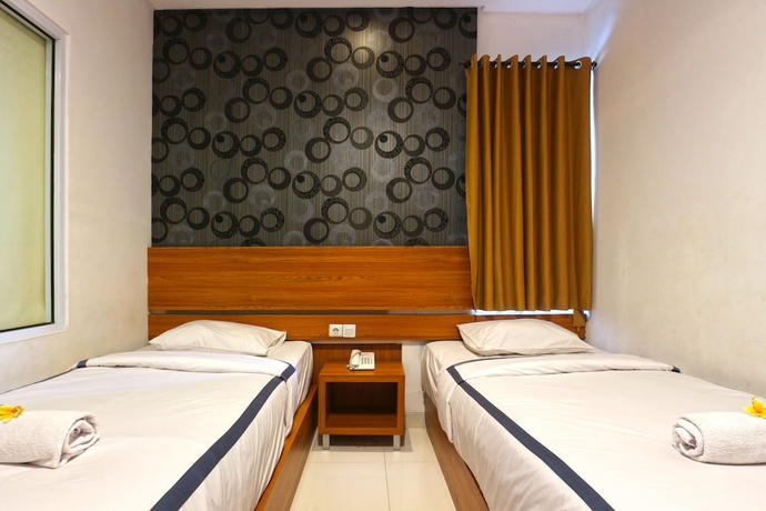 Imagen de la habitación del Hotel Size Inn. Foto 9