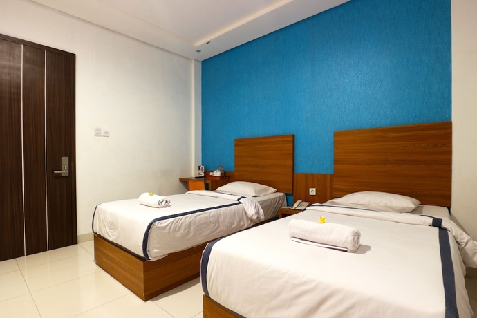 Imagen de la habitación del Hotel Size Inn. Foto 14