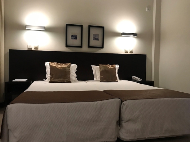 Imagen de la habitación del Hotel Sj. Foto 7