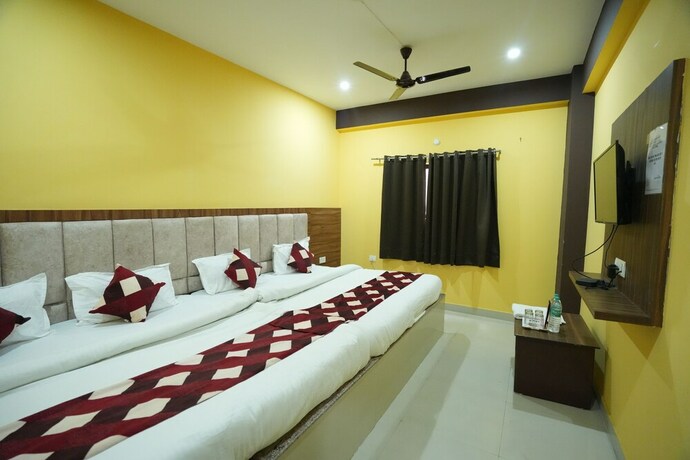 Imagen de la habitación del Hotel Sjh Venkatesh. Foto 12