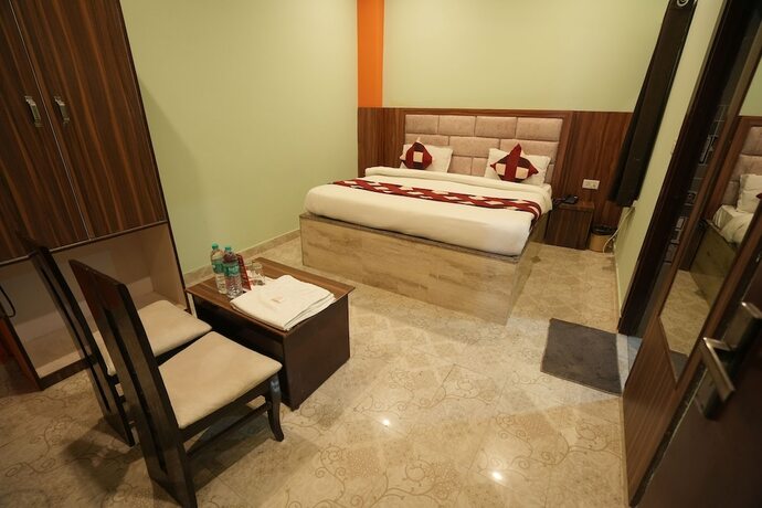 Imagen de la habitación del Hotel Sjh Venkatesh. Foto 16