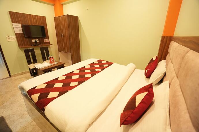 Imagen de la habitación del Hotel Sjh Venkatesh. Foto 19